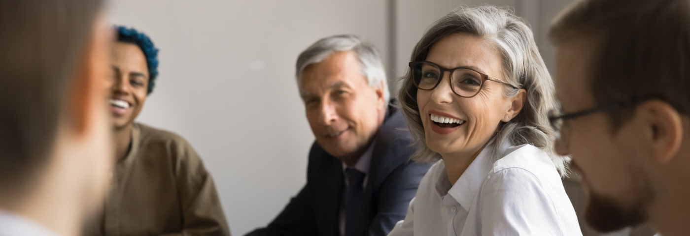 bizmeeting-older-woman-man-guy-w-beard-young-black-guy-shutterstock-2507450357.jpg